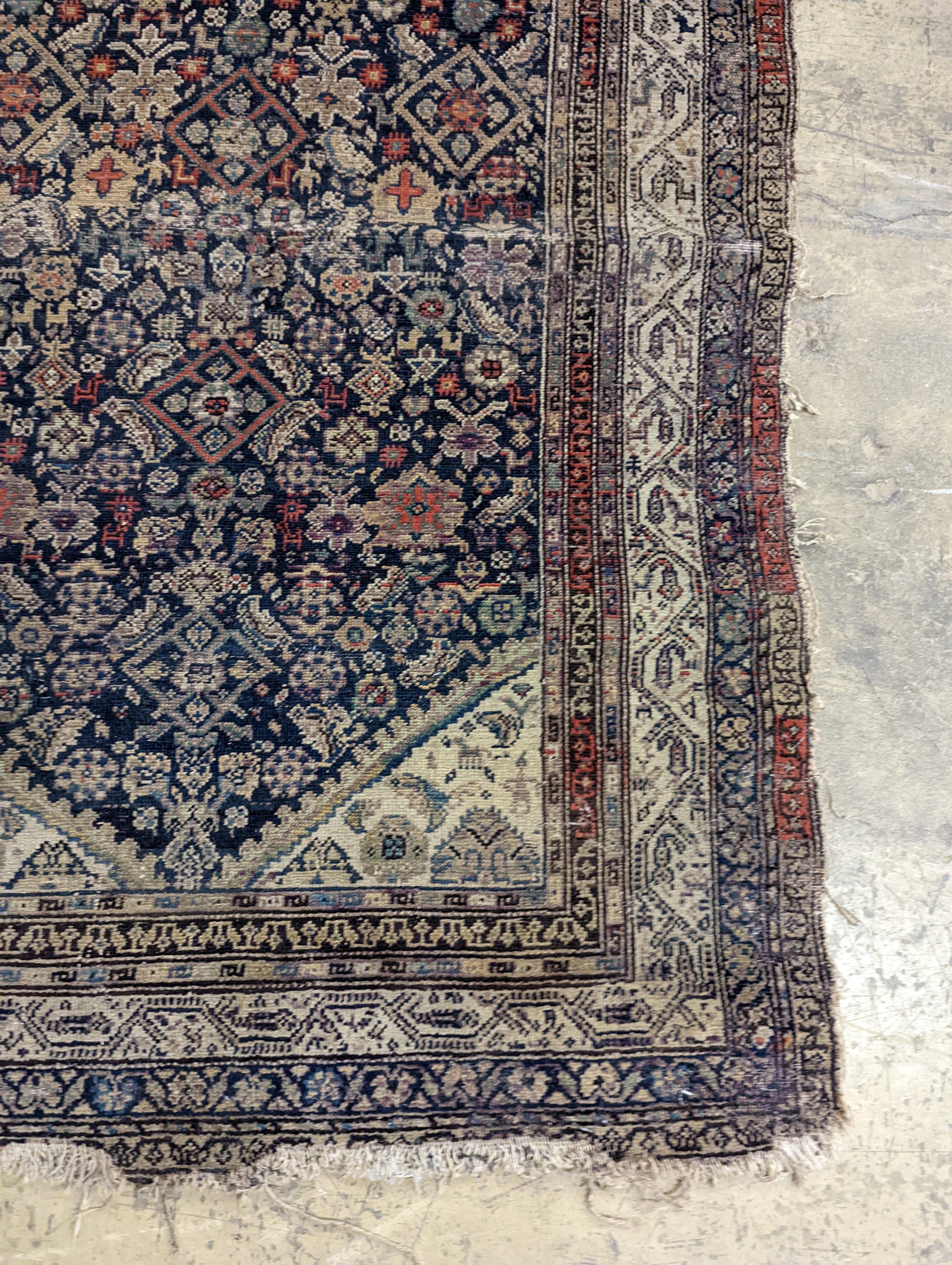 A North West Persian blue ground rug, 190 x 127cm